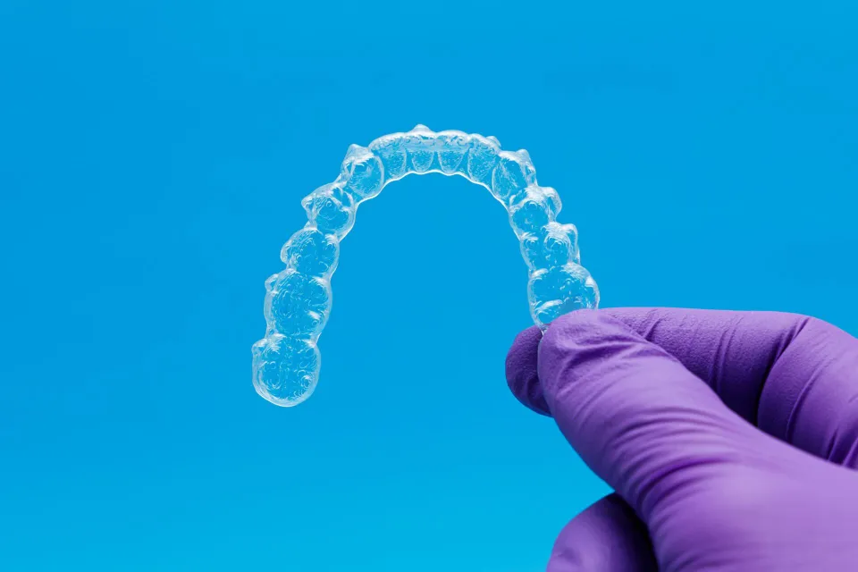 A clear Invisalign aligner